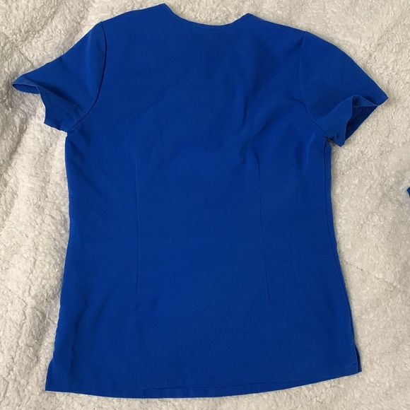 Only worn once. Clean Woman’s royal blue “Catarina” one pocket scrub top - Picture 2 of 4